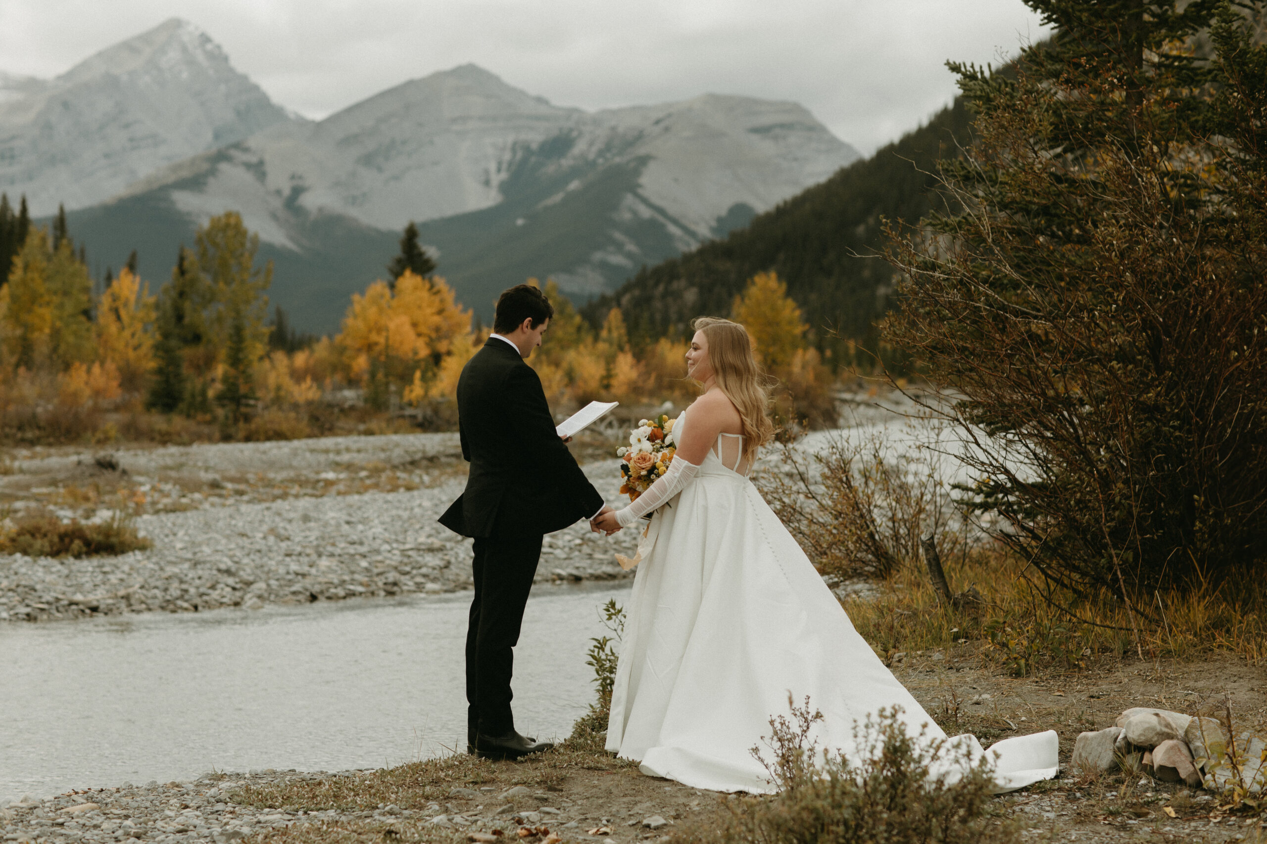 Bragg Creek wedding private vows by river