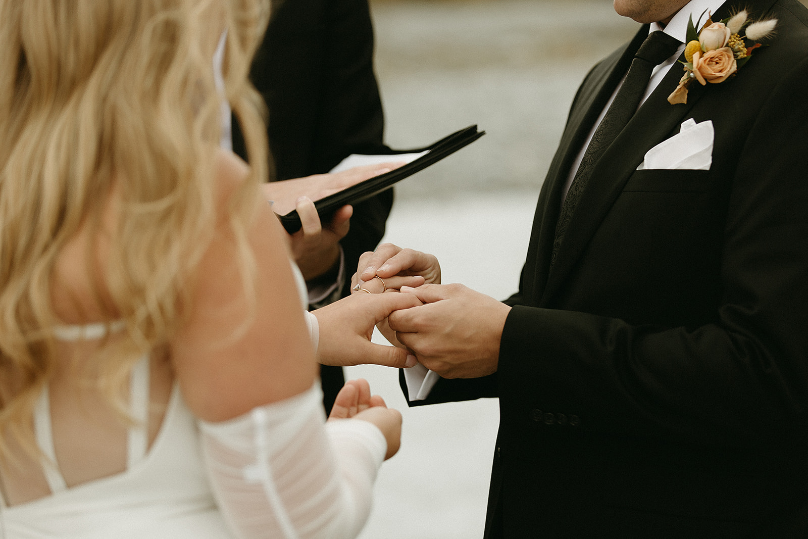 ring exchange during a private Bragg Creek wedding ceremony 