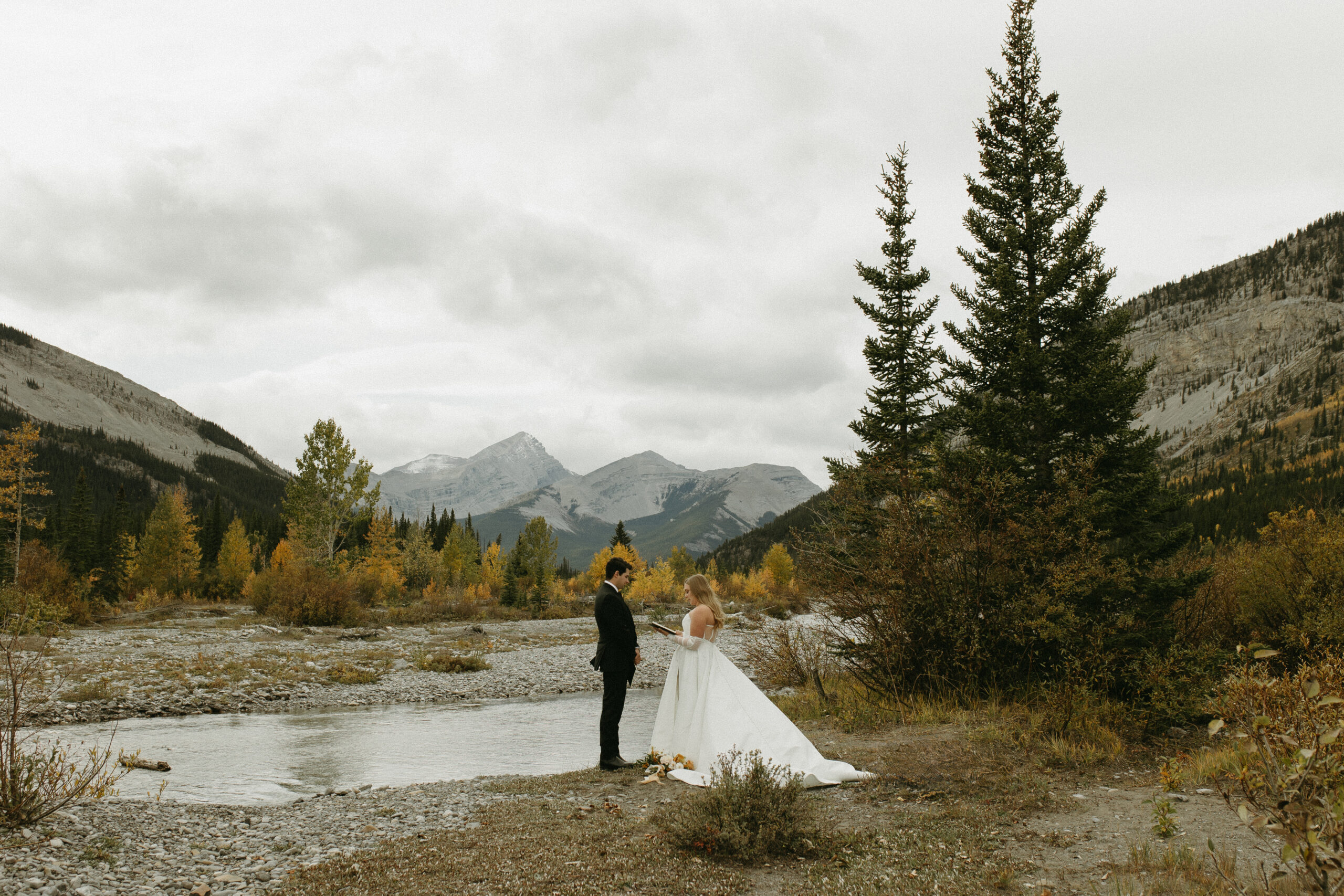 couple shares private vows in nature for their Bragg Creek wedding