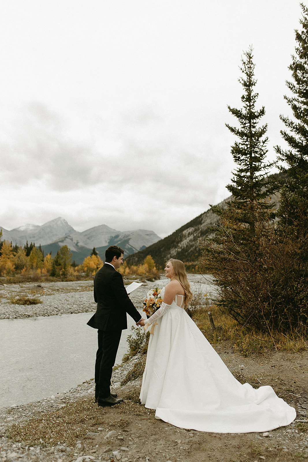 Bragg Creek wedding private vows by river